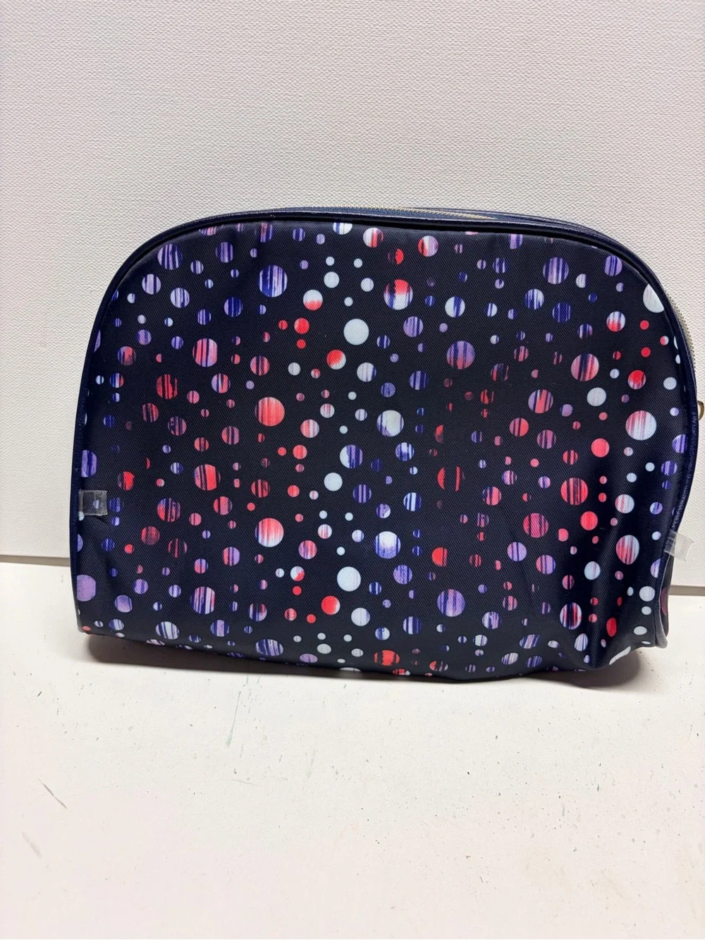 Adrienne Vittadini Navy Cosmetic Bag with Multicolor Dot Pattern